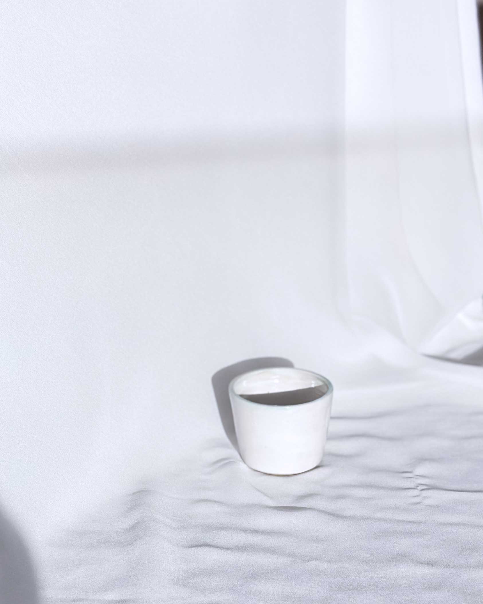 White ceramic bowl on a white background